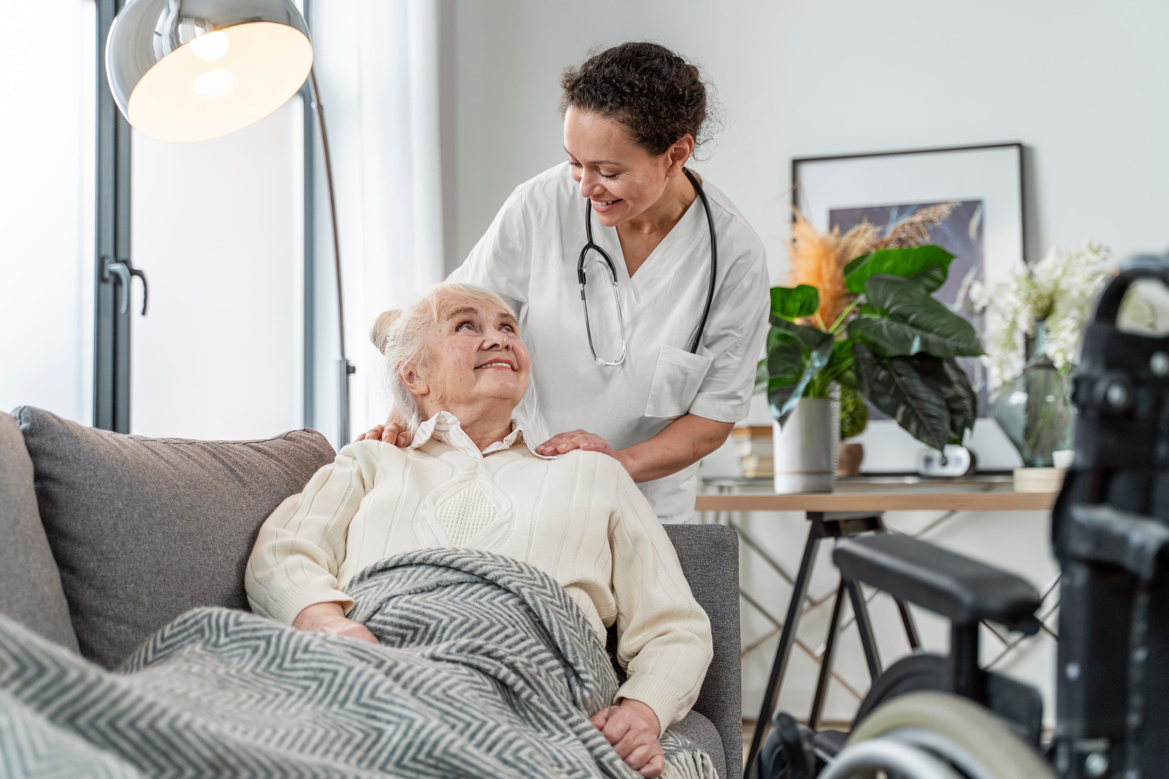 Caregiver smiling with patient